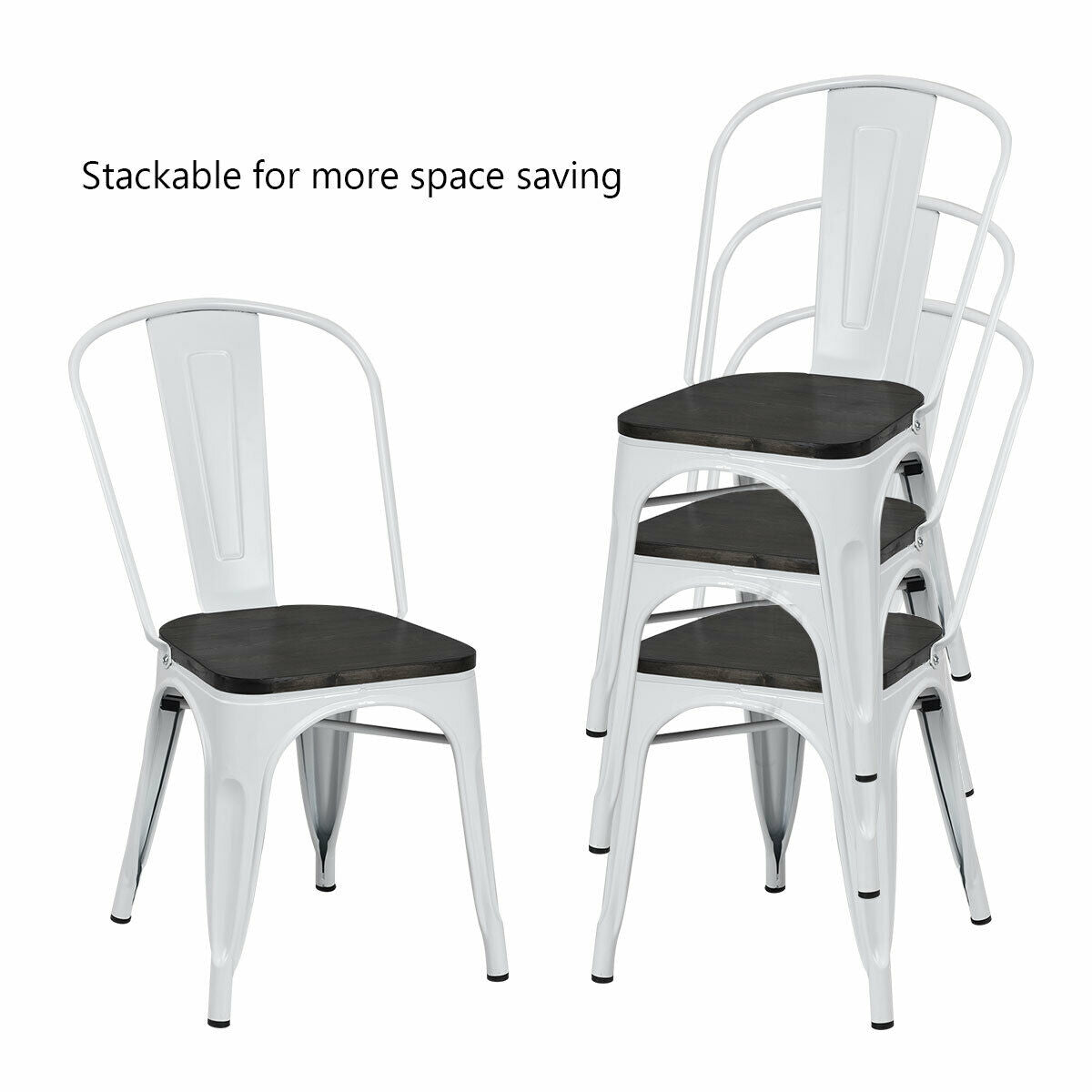 One white metal chair sits beside a nested stack of matching chairs, all with dark seats.