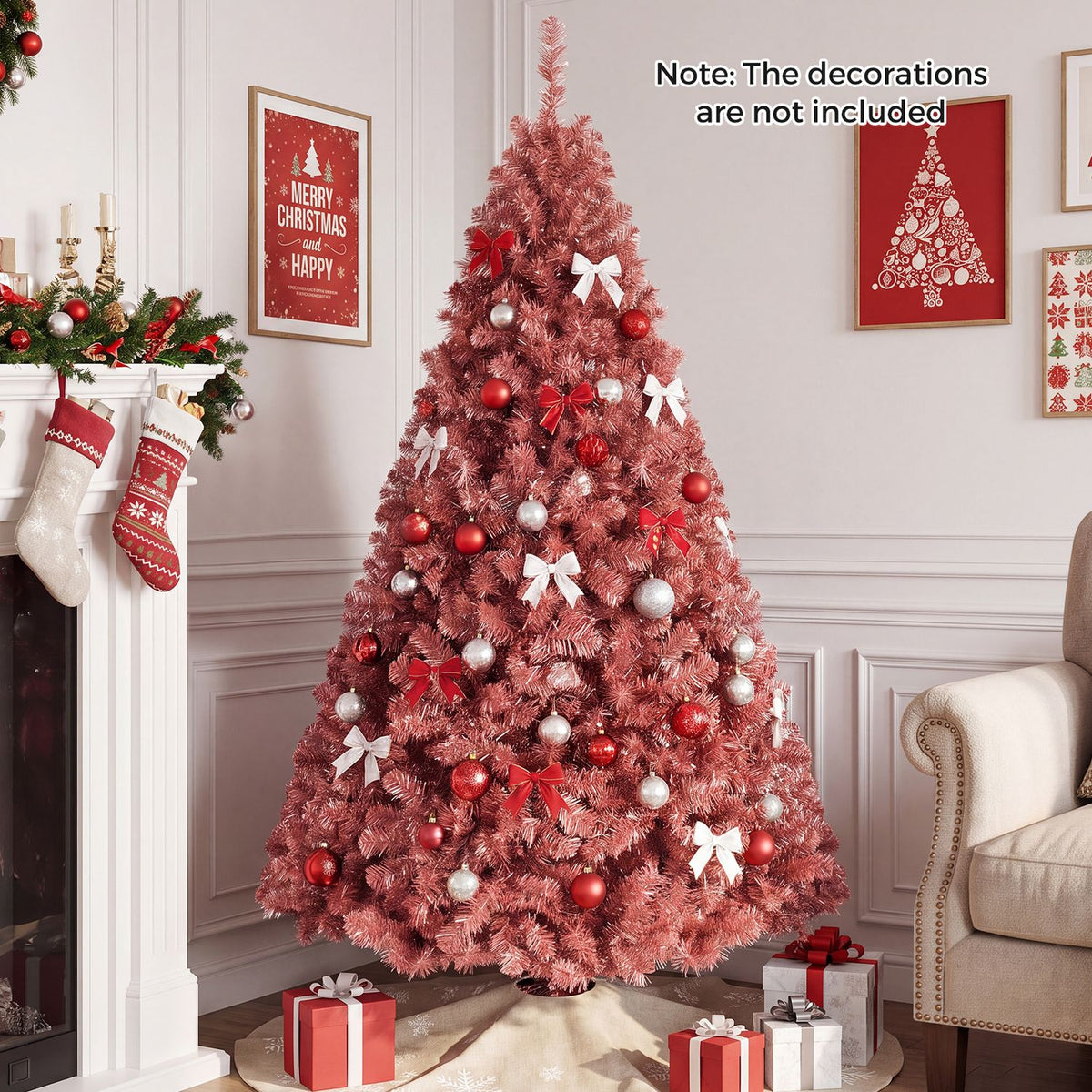 A red artificial tree decorated with bows and baubles stands in a bright living room.