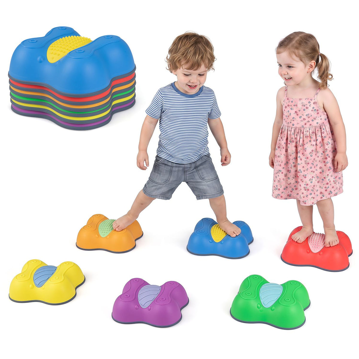 Two children stand on colorful butterfly stepping stones beside a stack and three loose stones.