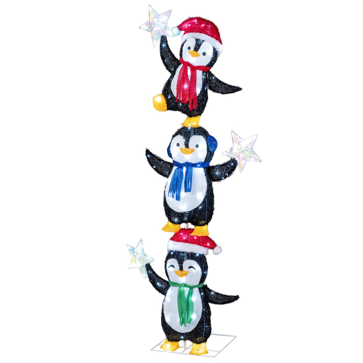 Full view of the three-penguin decoration against a white background