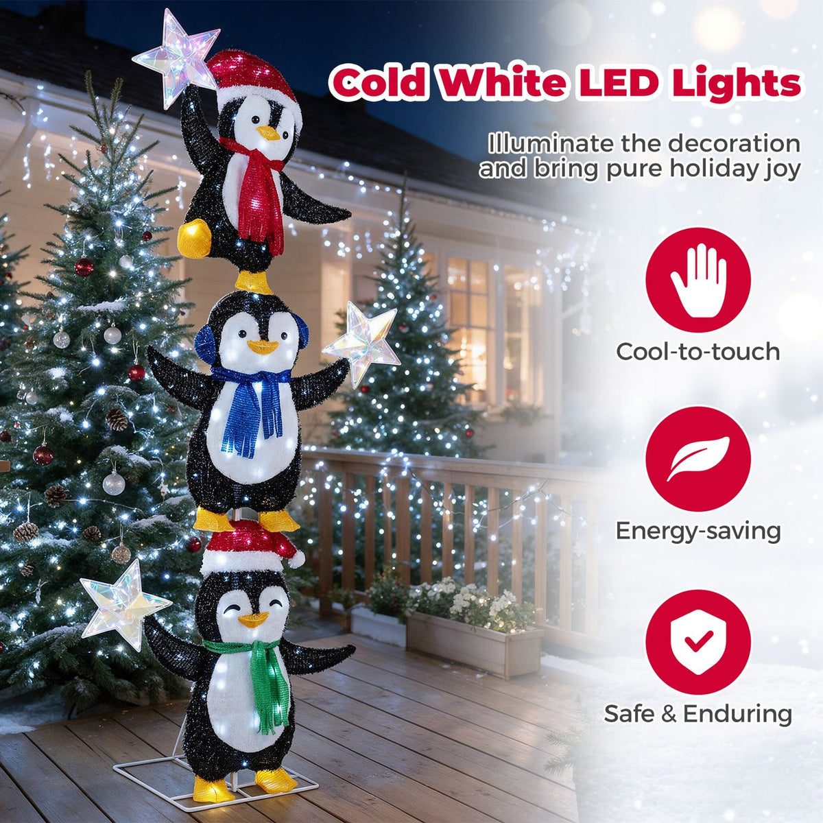 Lighted penguin decoration outdoors at night beside an LED feature graphic