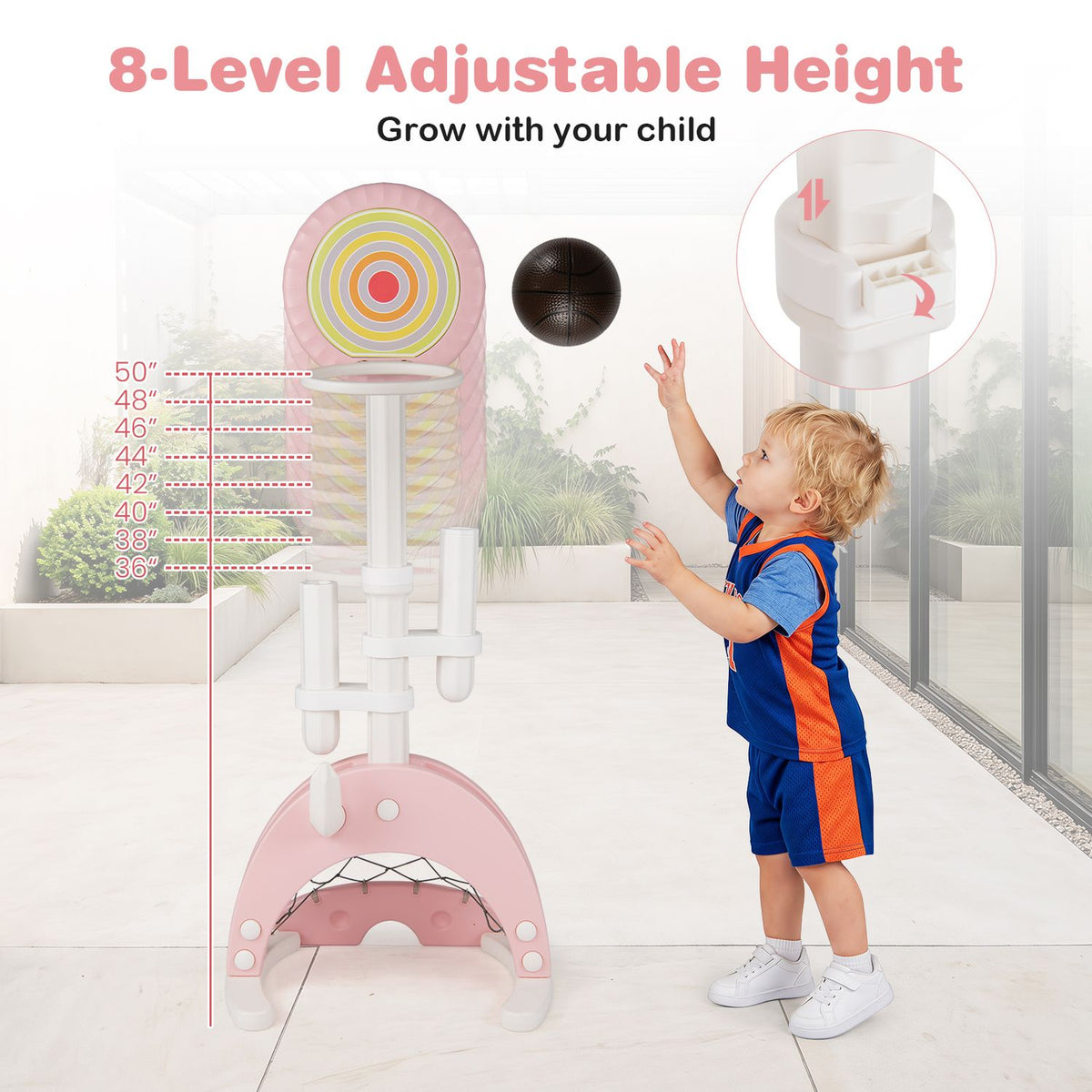A child reaches toward a ball beside the pink basketball stand, with a close-up of its height adjustment.