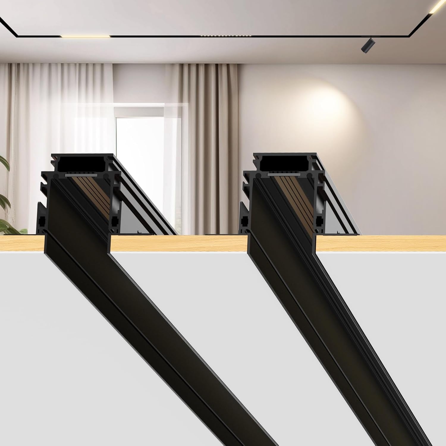 Close-up cross-section illustration showing two black recessed track rail profiles set into a ceiling panel edge.