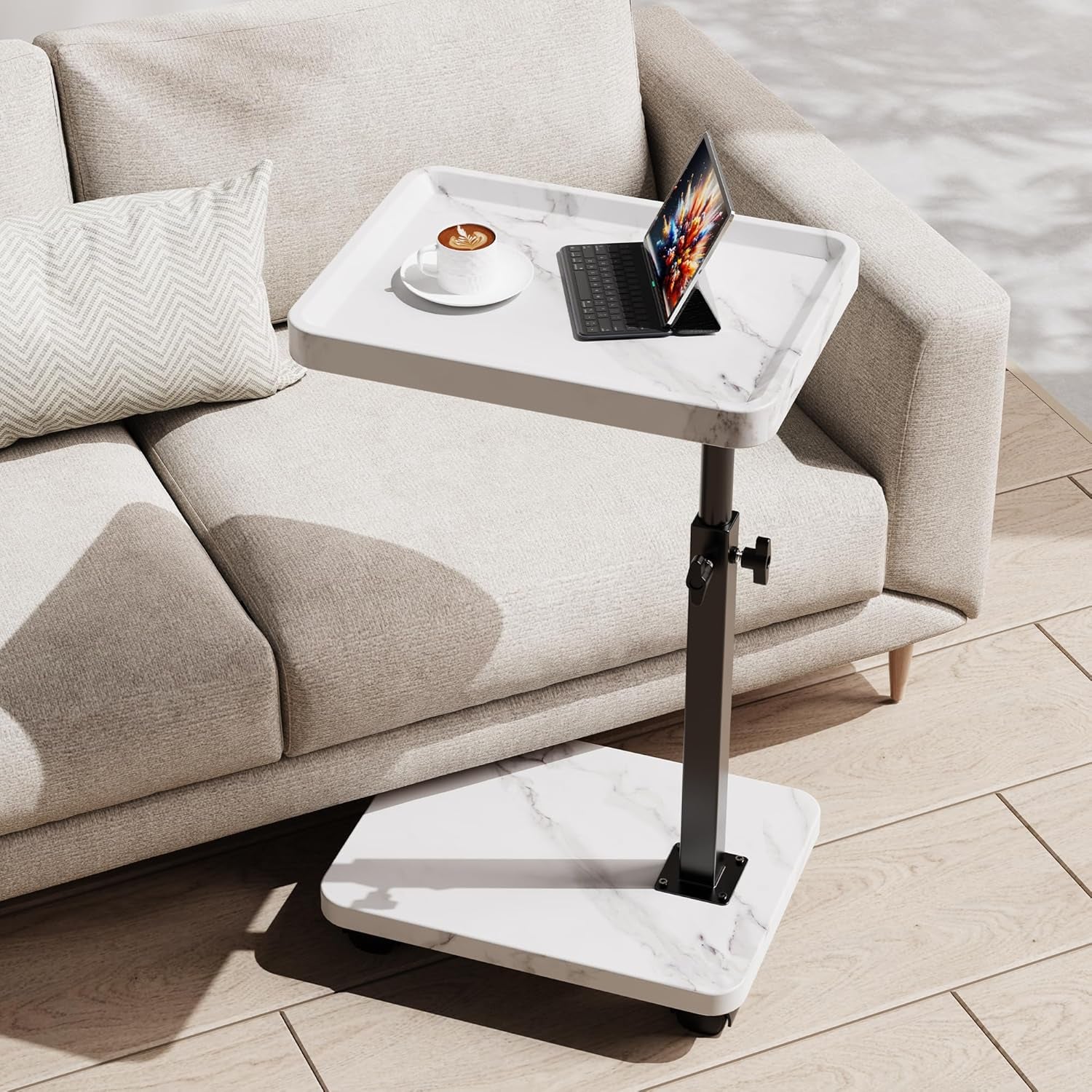 C-shaped adjustable end table with white marble-look top and base beside a light beige sofa.
