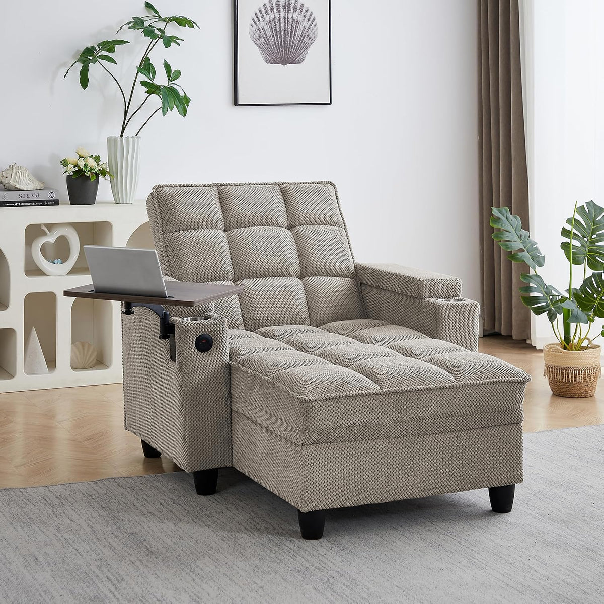 Single beige chaise angled to show tufted backrest, armrest cup holder and laptop tray in use.