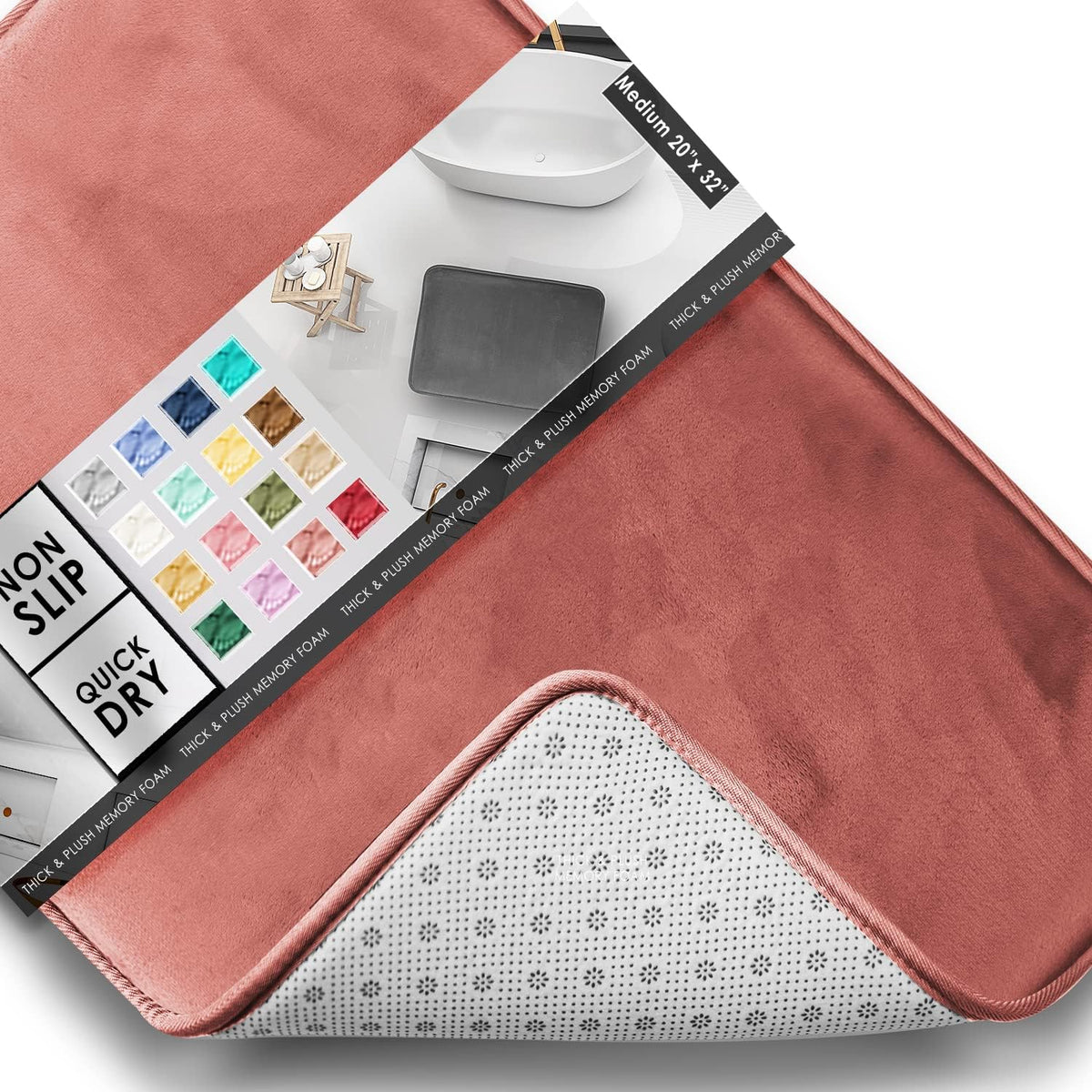 Diagonal close-up of a dusty rose rectangular mat with packaging strip and corner lifted to show dotted non-slip underside