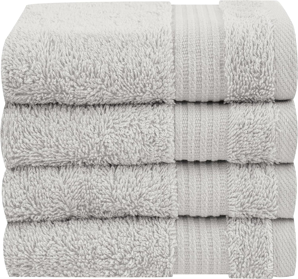 Close stacked view of four light gray towels showing looped terry texture and ribbed band