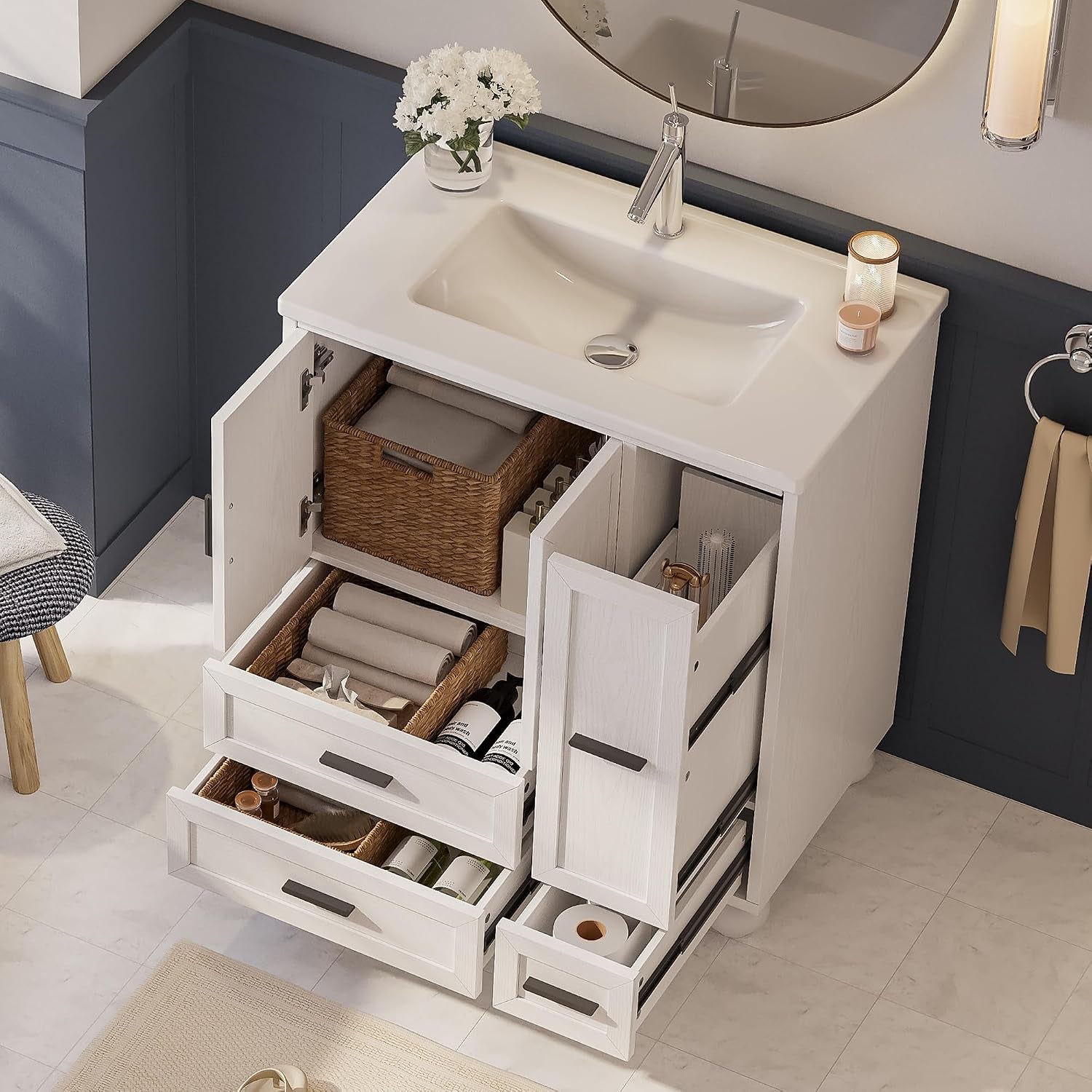 Angled overhead view of the vanity with cabinet doors and drawers open showing interior storage and baskets