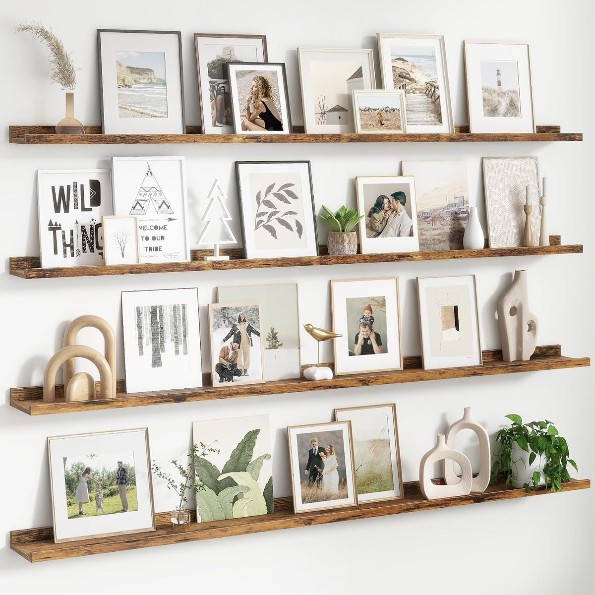 Three warm brown floating ledges filled with framed photos and ceramic accents.