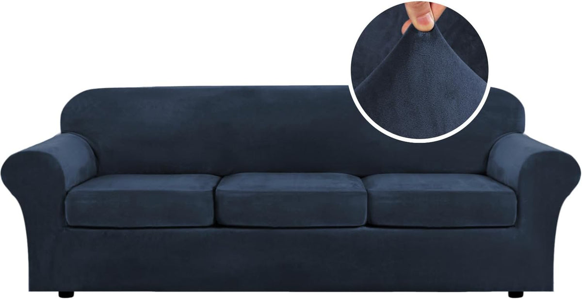 Front-facing navy blue three-cushion sofa on a white background with a circular close-up of the velvet fabric being pinched.