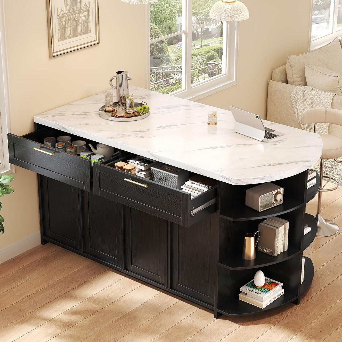 Side angle showing two open top drawers filled with kitchen items and a laptop on the white faux‑marble countertop, rounded