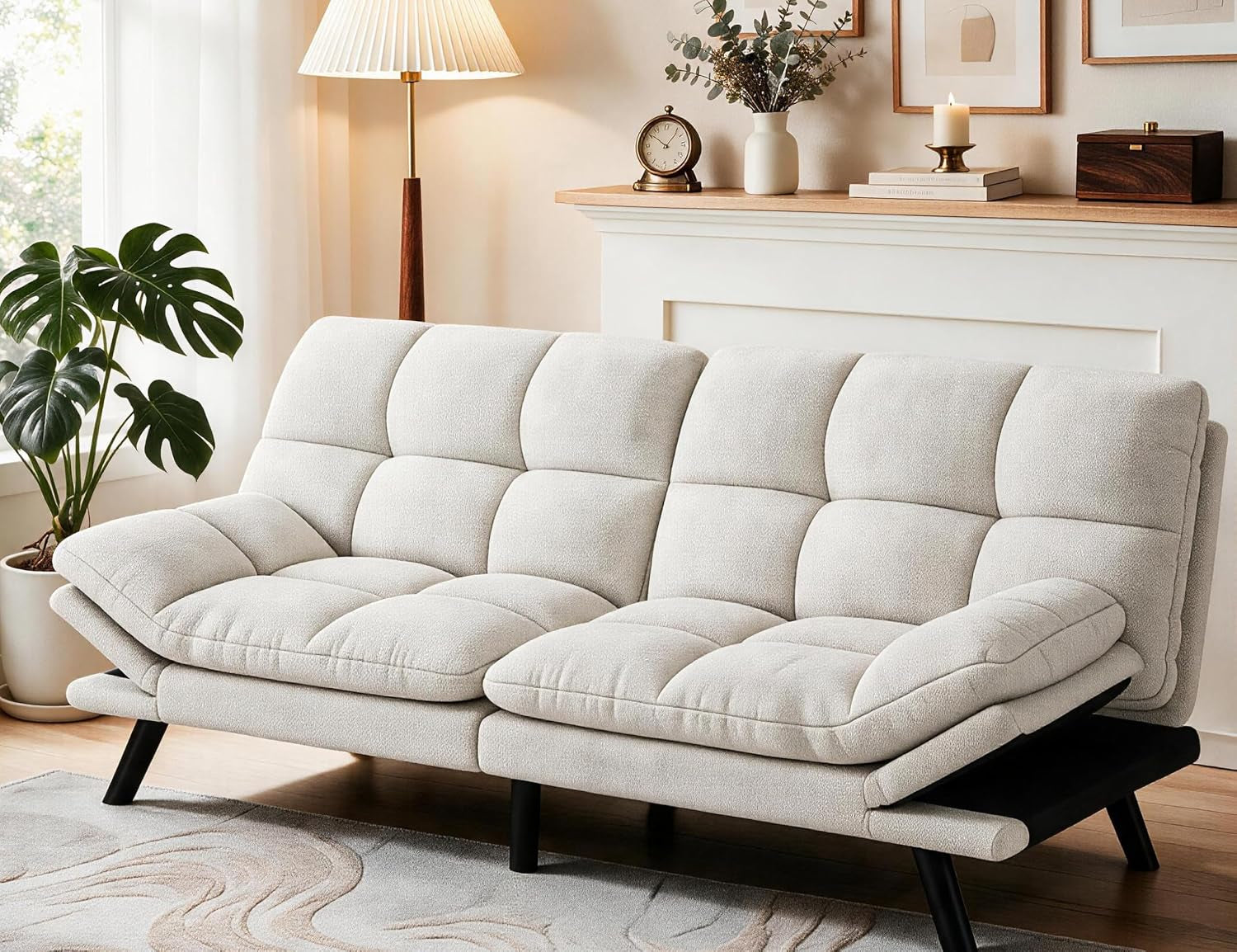 Beige 70in convertible futon sofa angled front view with armrests partially reclined in living room