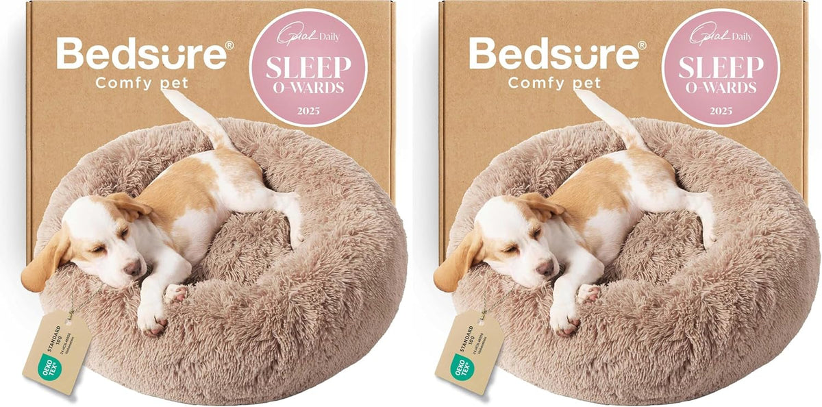 Two identical boxed beige pet beds shown side-by-side, each with a small dog curled inside