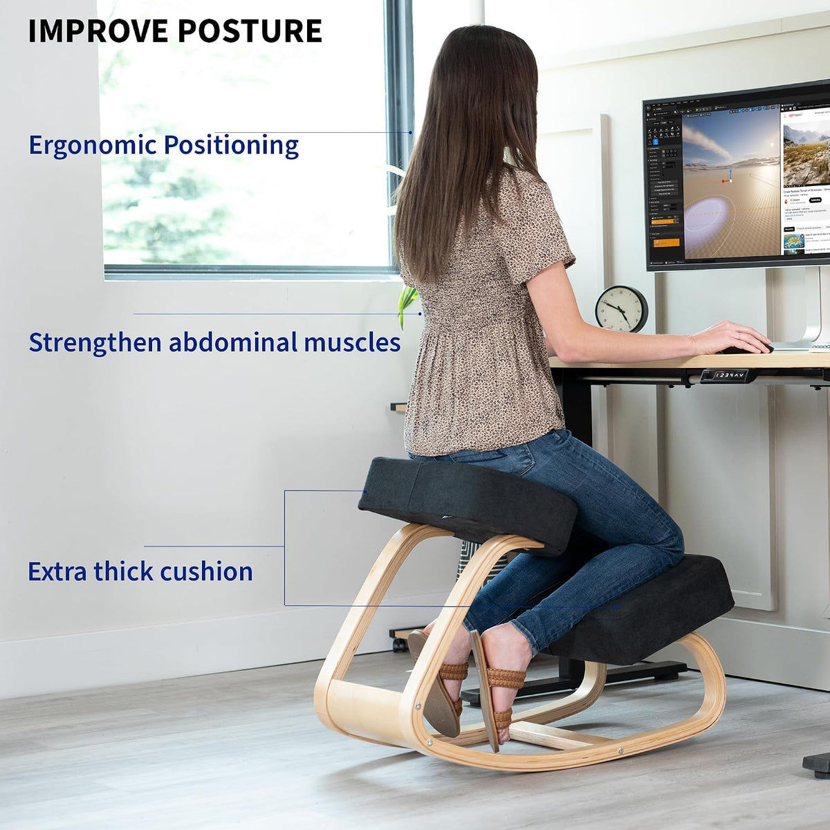 User seated on the black-cushioned kneeling chair at a desk demonstrating an upright posture, light wood frame visible