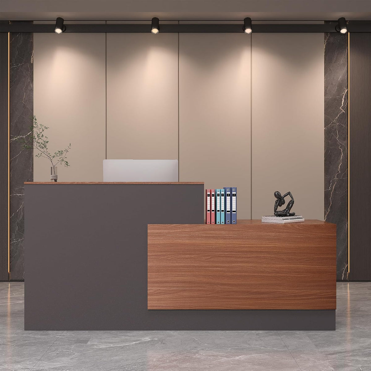 Slate gray reception counter with a walnut front panel, binders and a small sculpture on the return