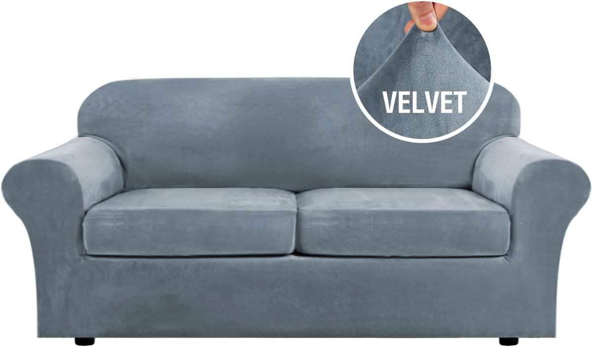 Powder-blue three-seat sofa front view with visible seam between cushions and a round inset showing the plush velvet held