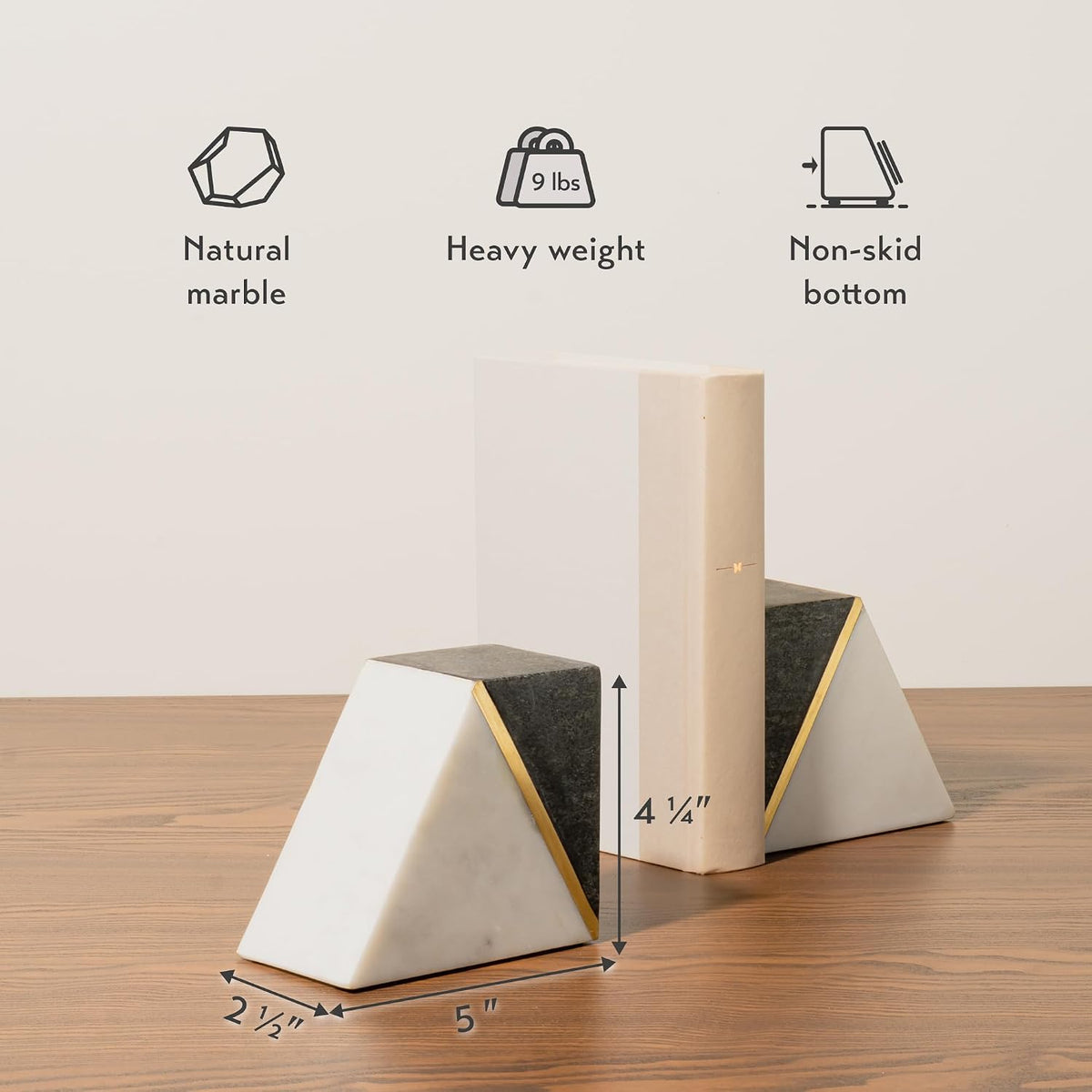 Two bookends on a table with a book between them, measurement arrows and three icons shown above