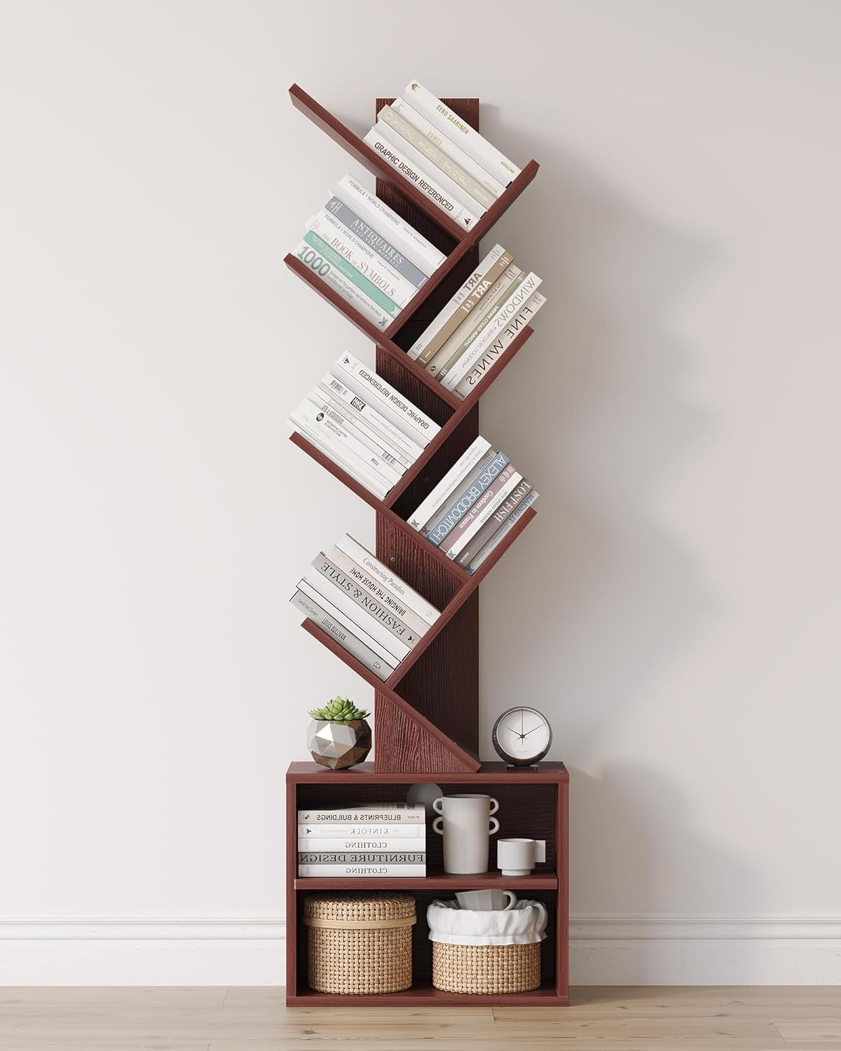 Same six-tier tree bookshelf in warm brown finish holding books and baskets on lower shelves.