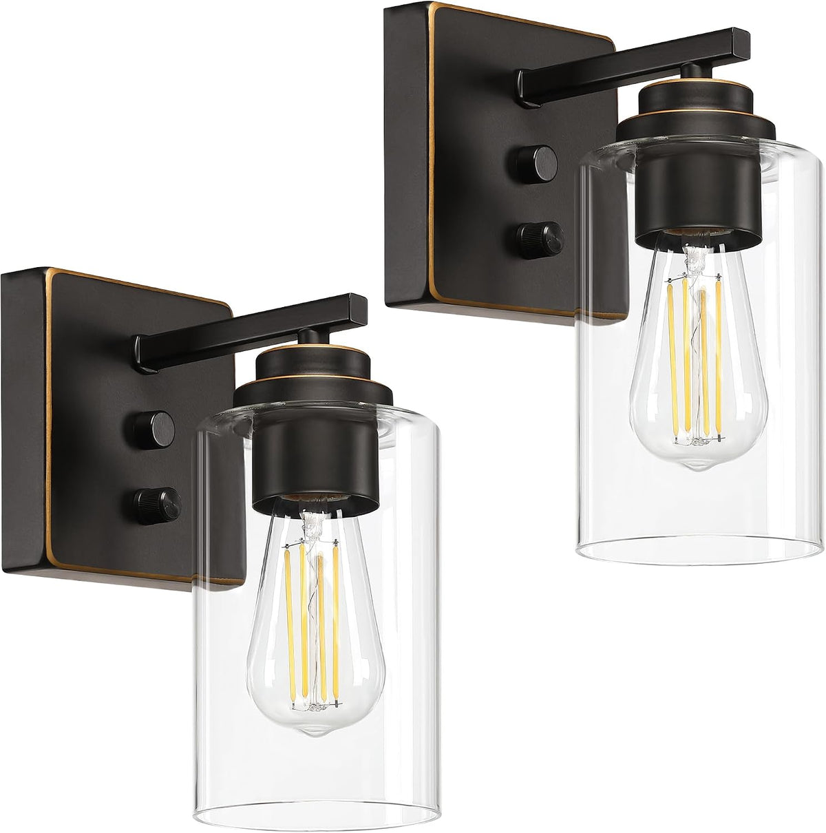 Two matte black sconces with clear cylindrical shades shown against a white background, angled view.