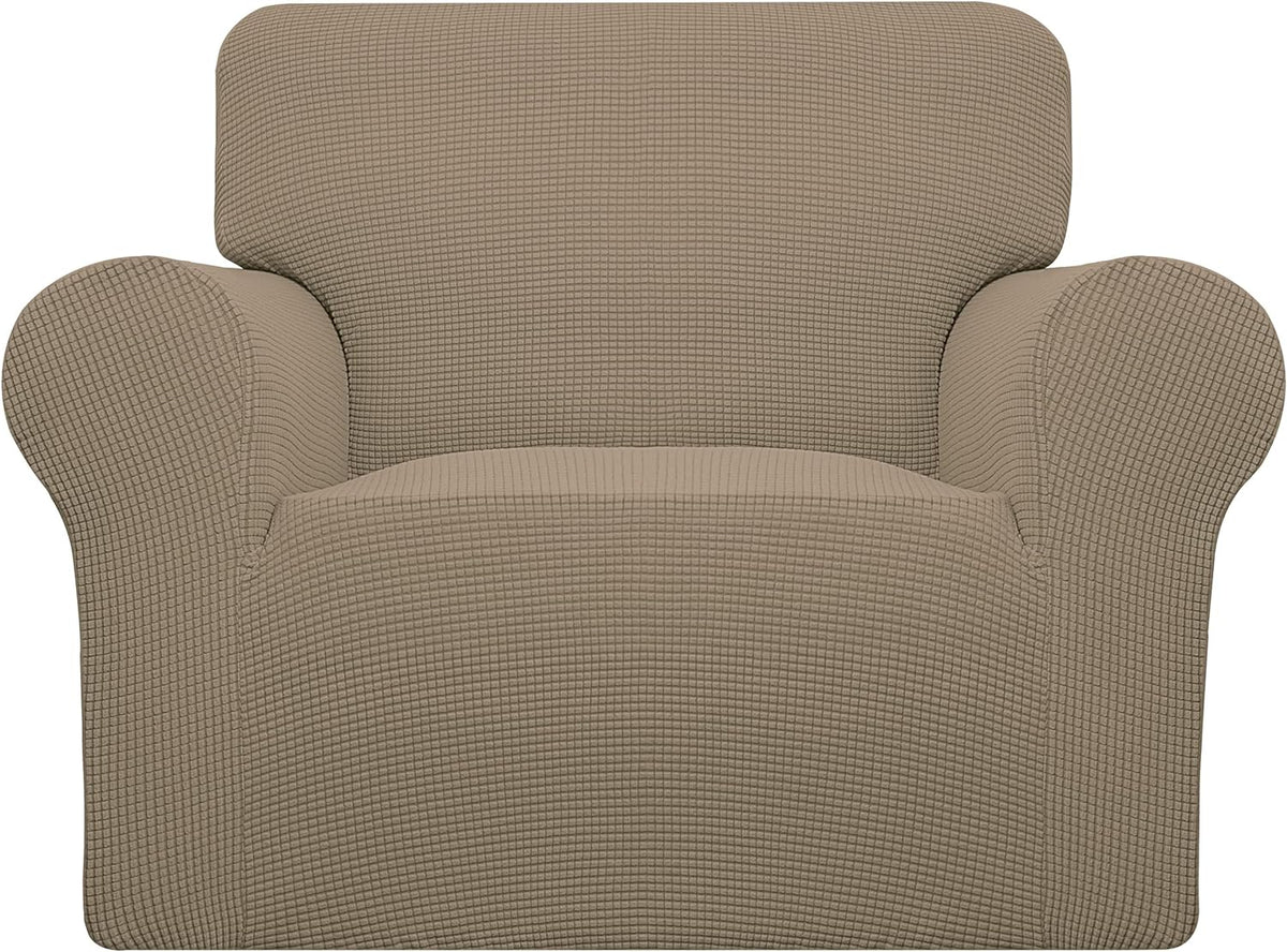 Front-facing armchair draped in a warm beige textured stretch cover against a plain backdrop.