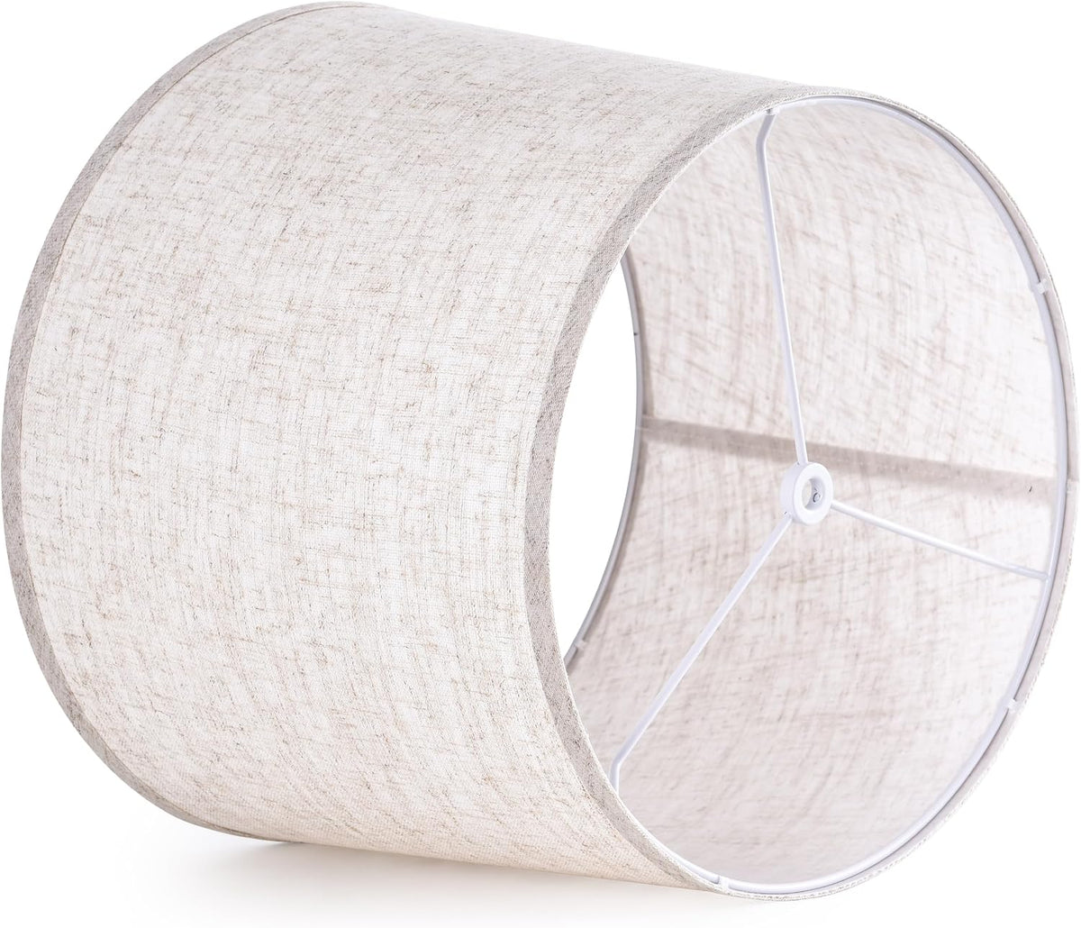 Beige linen shade on its side showing interior spider fitter and round metal frame