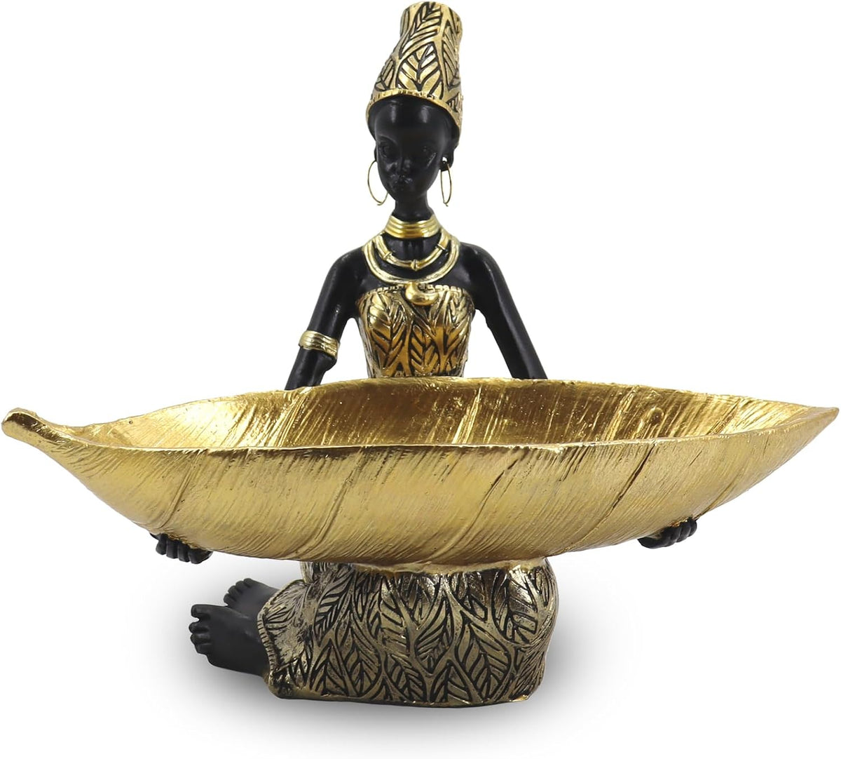 Seated black resin African woman holding an elongated gold leaf tray, front close-up on a white background