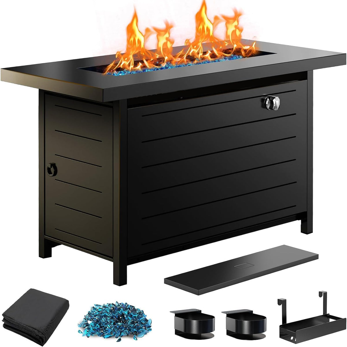Black rectangular propane fire pit table shown front three-quarter with flames, lid panel and accessory pieces below.