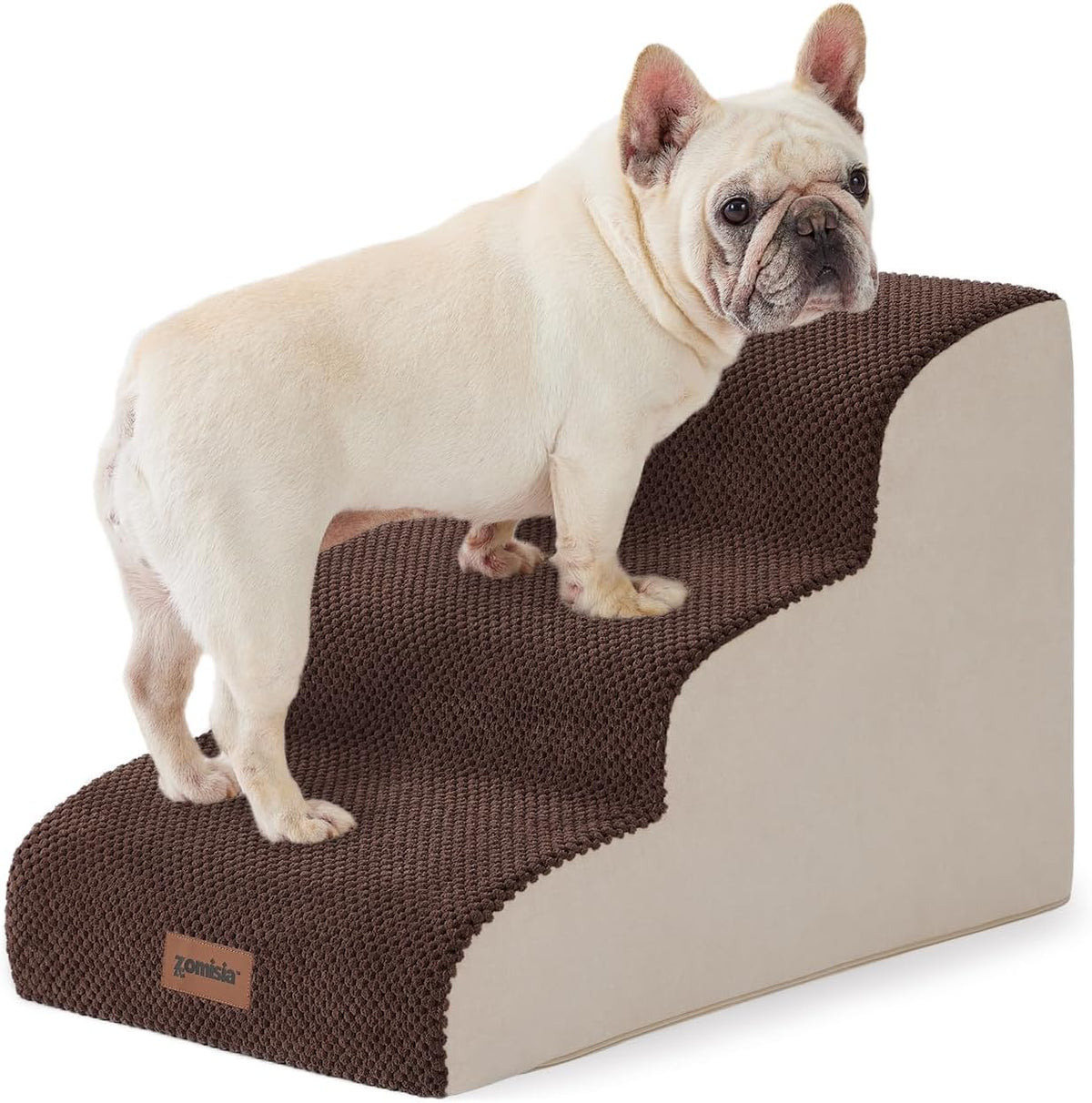 Brown textured cover on three-step foam pet stairs with a small cream bulldog standing on them