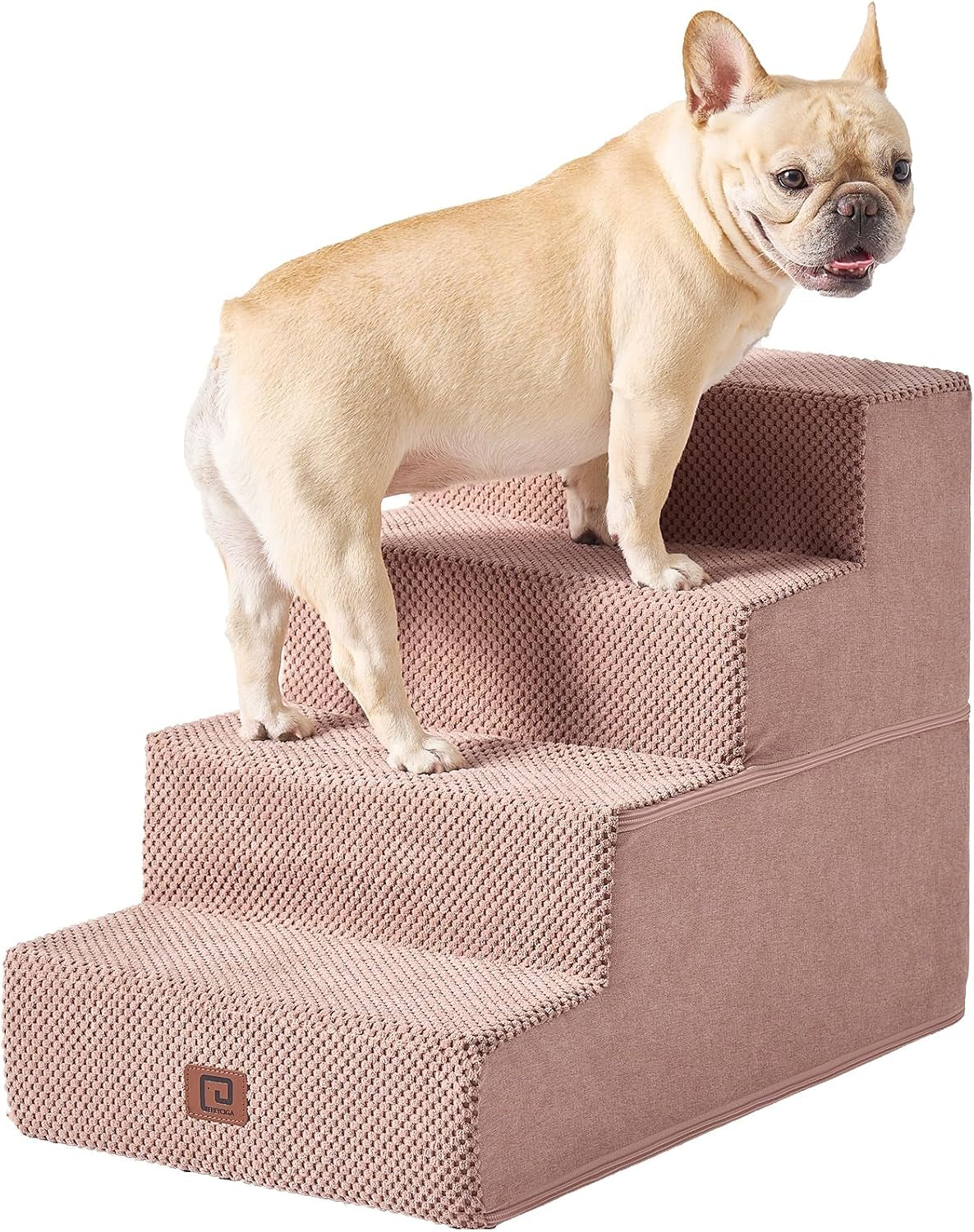 Front three-quarter view of pink four-step pet stairs with a small fawn French bulldog standing on the top steps