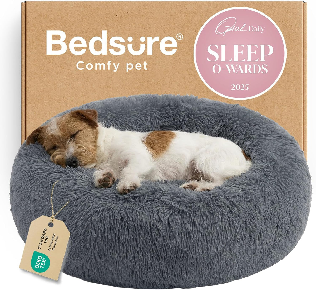 Small brown-and-white dog curled sleeping in a dark gray round faux-fur donut bed