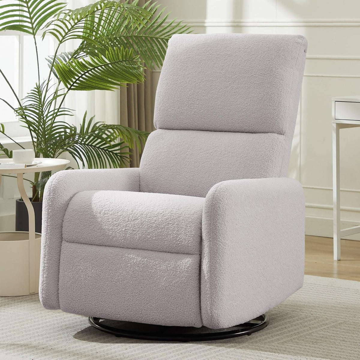 Light gray sherpa accent rocker in a living space with potted plant and side table