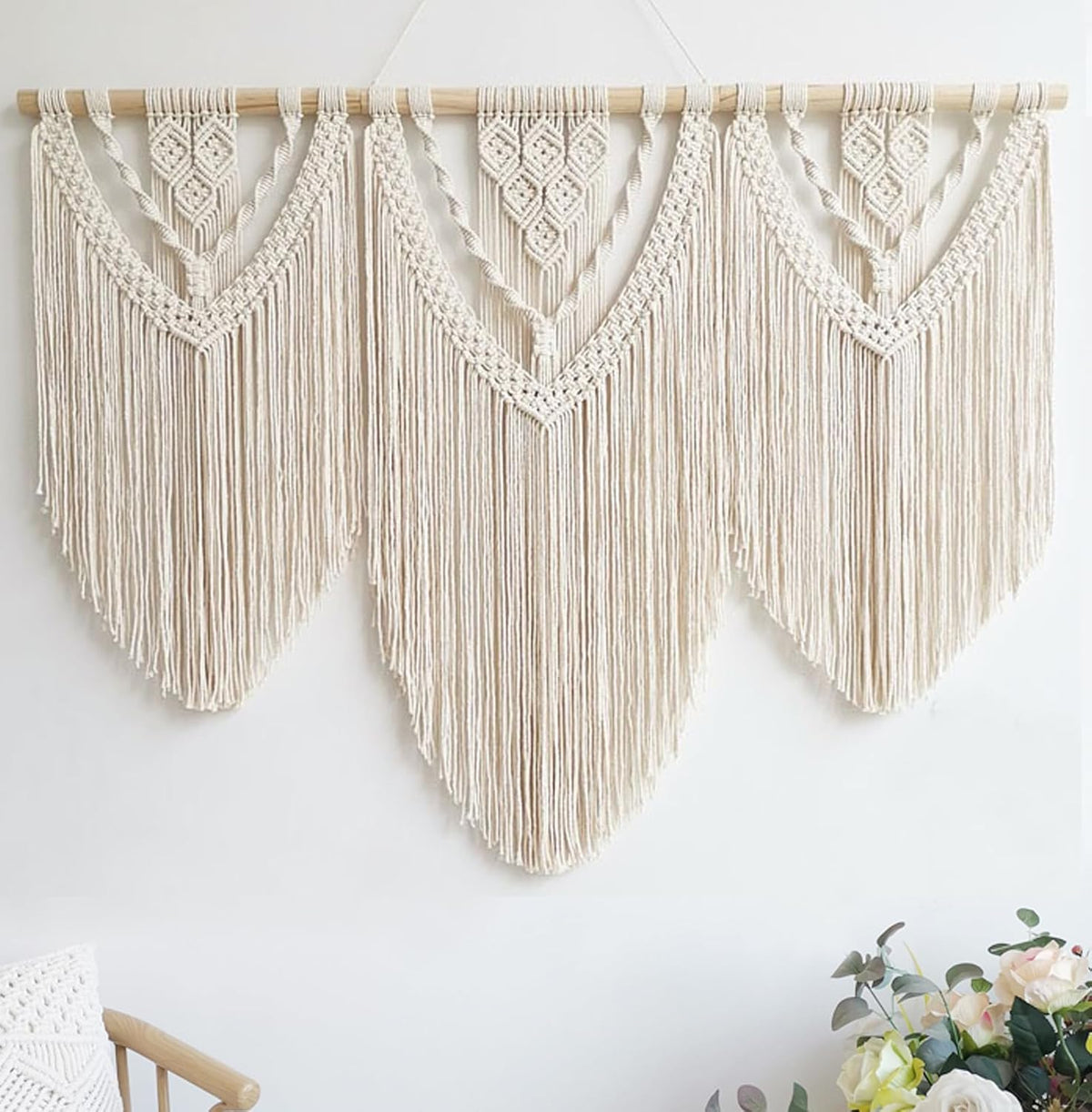 Top section showing the wooden hanging rod with multiple looped cord attachments and twisted rope accents.