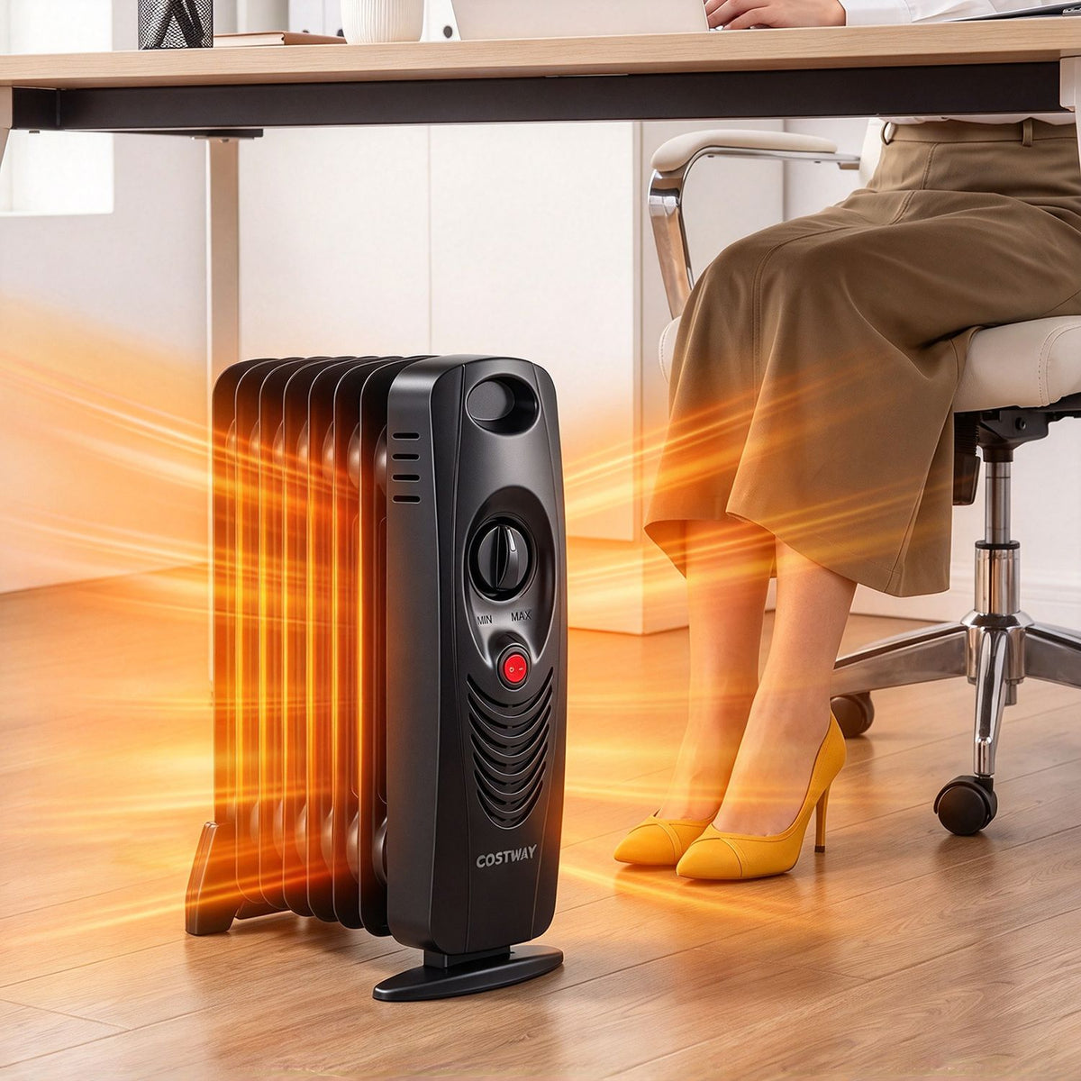 Black radiator heater beside a desk and office chair in a warm-toned room