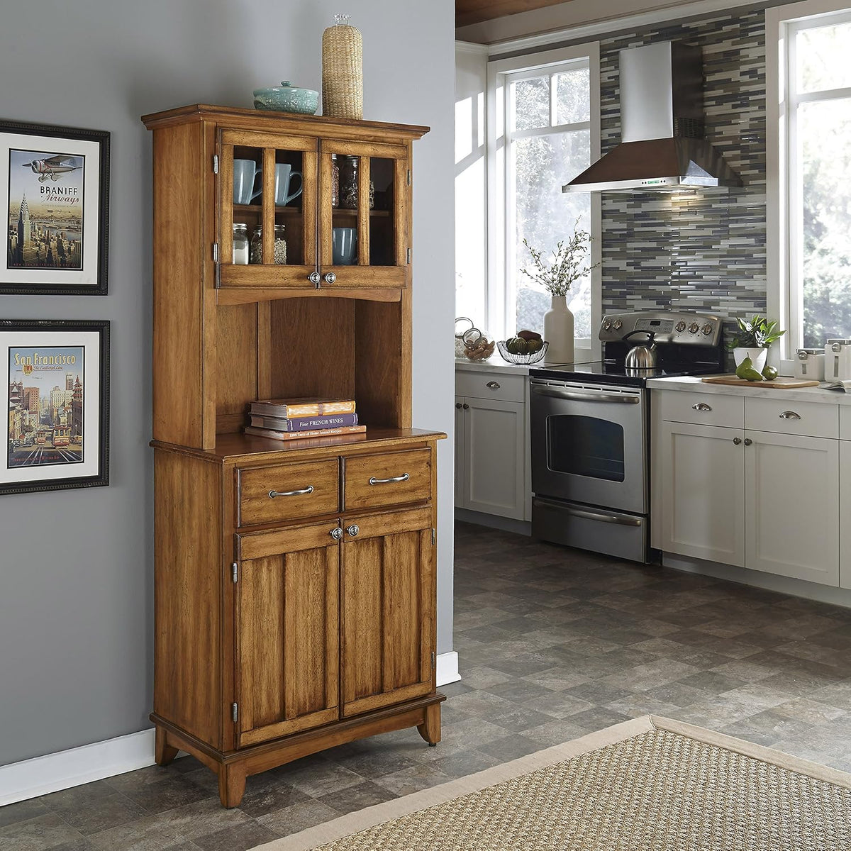 Cottage oak buffet server with hutch styled in a kitchen setting, angled front view showing open counter area