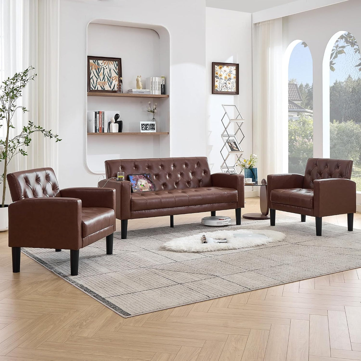 Brown tufted sofa and two armchairs showing side profiles and black tapered wood legs