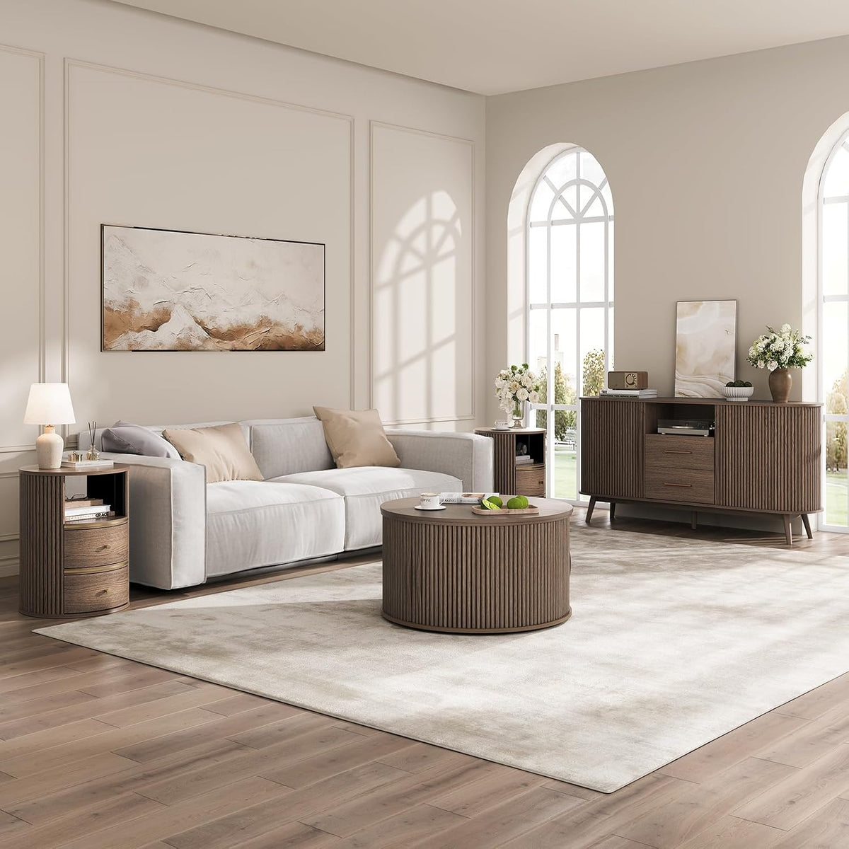 Walnut round side table beside a sofa in a living room scene highlighting the fluted exterior and open shelf
