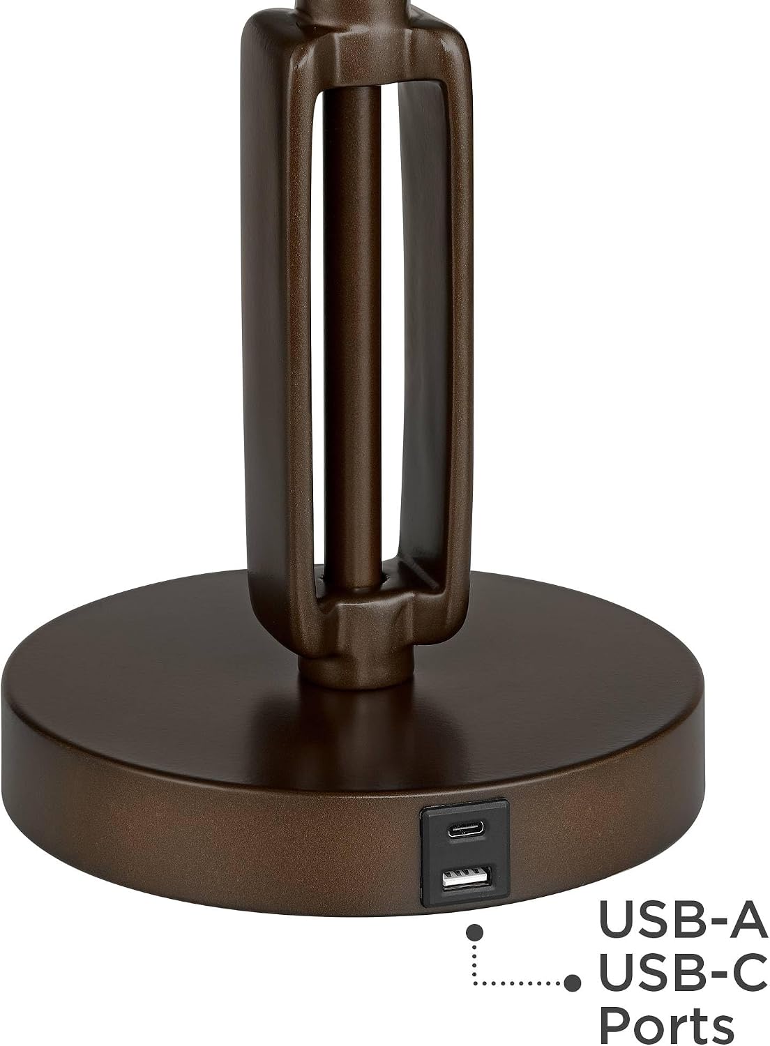 Close-up of the round bronze base with visible USB-C and USB-A ports