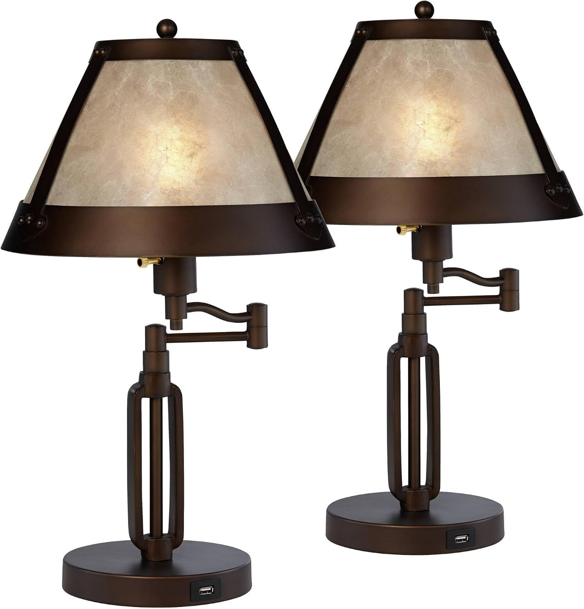 Cropped view of two lamp heads and upper columns showing mirrored mica shades and round finials