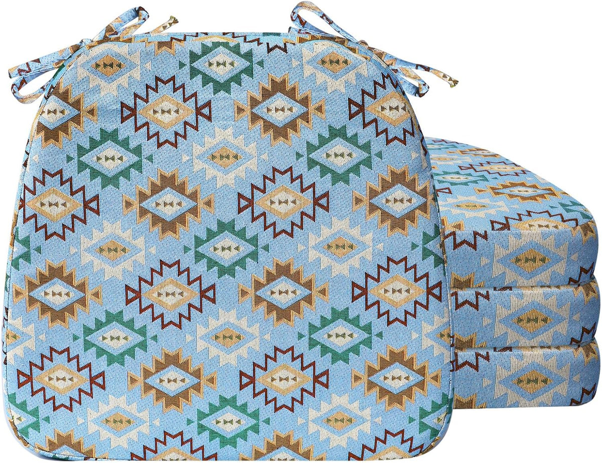 Front cushion with southwestern geometric blue pattern and three matching cushions stacked behind