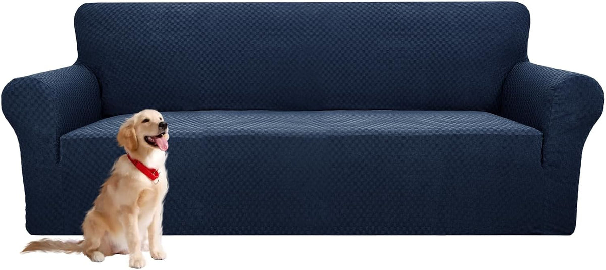 Dark blue patterned sofa cover on a three-seat couch with a golden retriever sitting beside it