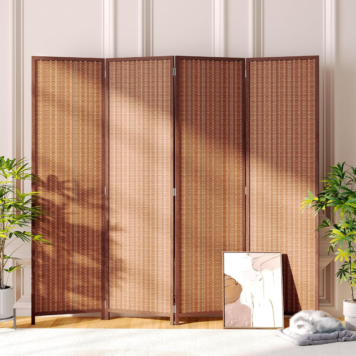 Warm-toned four-panel bamboo screen with darker frame set against paneled wall and houseplants
