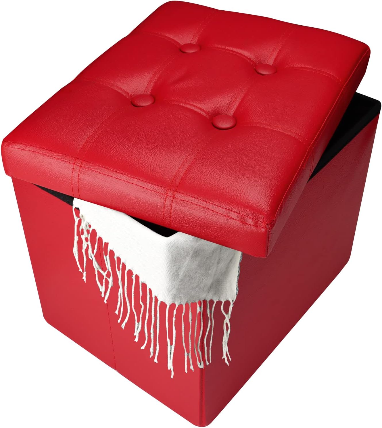 Red faux-leather ottoman with tufted lid propped open and a fringed white throw draped from the interior