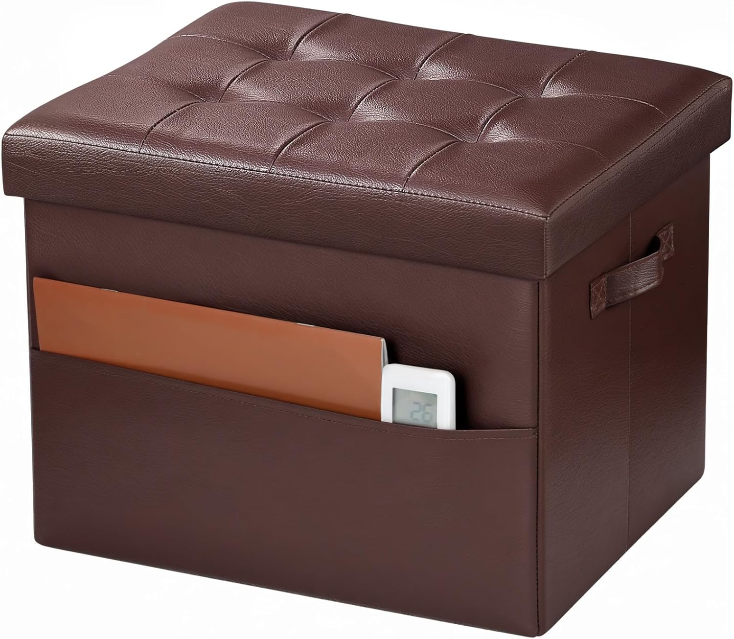 Brown tufted storage ottoman with side pocket holding a folder and a small digital device.