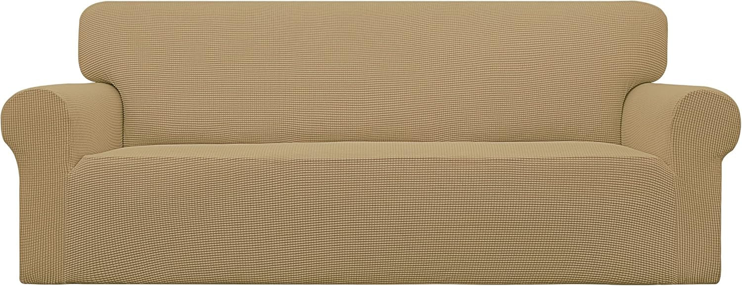 Front-facing loveseat covered in a warm tan textured stretch slipcover on white background