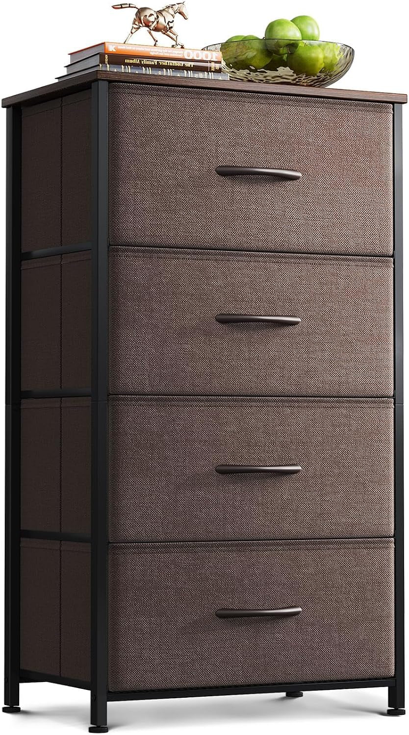 Narrow four-drawer dresser with brown fabric drawers, black metal frame and wood top styled with books and a bowl.