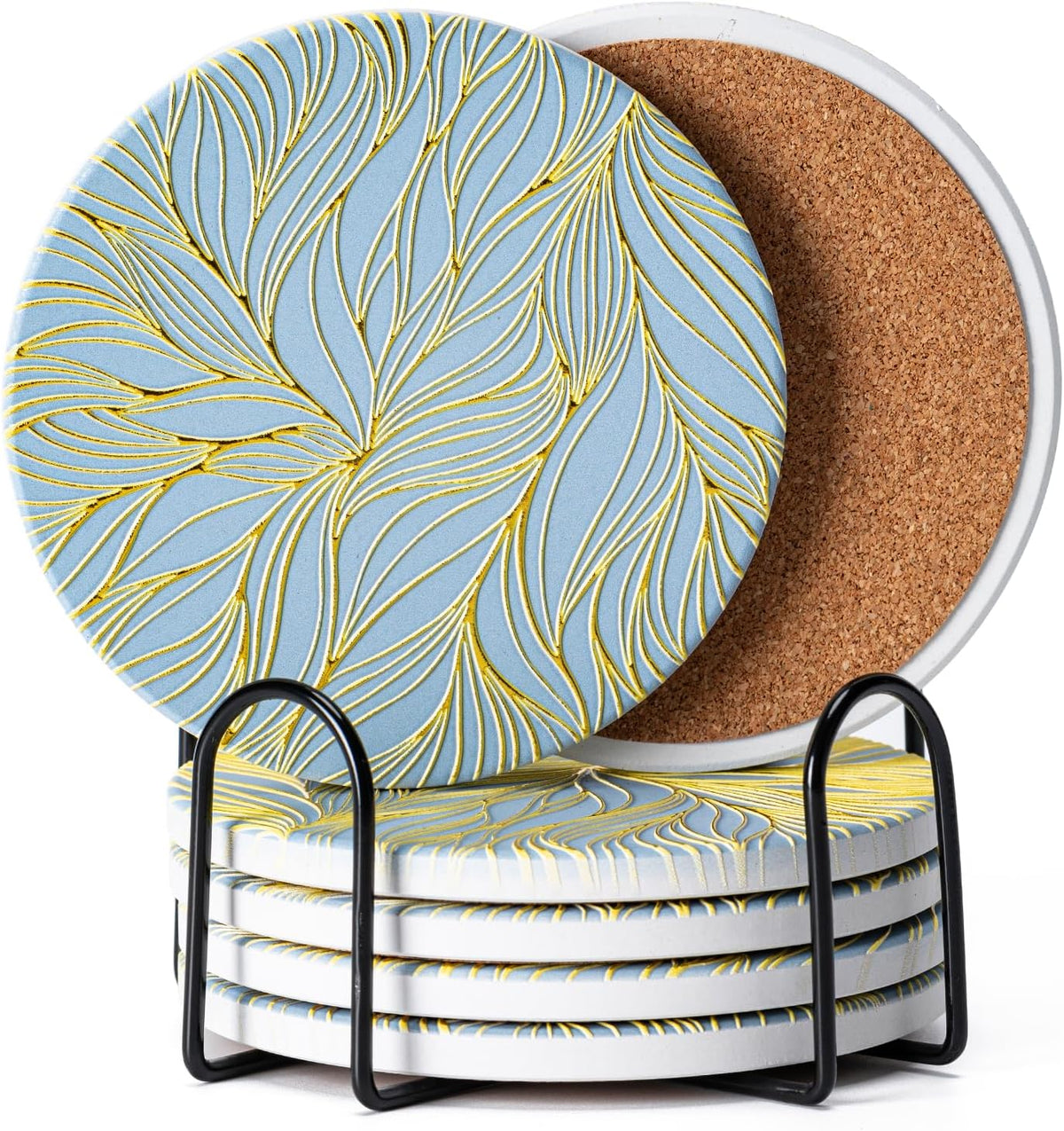 Close view of a stack of round coasters in a black metal holder; top shows blue surface with gold embossed pattern and a
