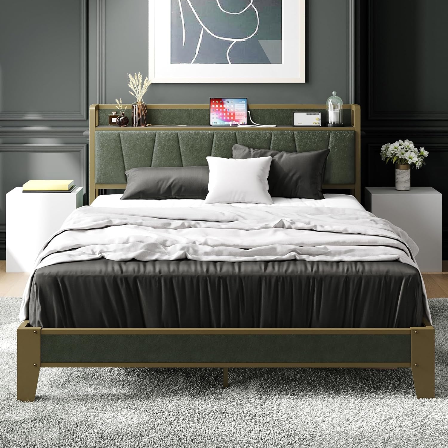 Front view of a bed with olive-green upholstered headboard and gold metal frame in a styled bedroom.