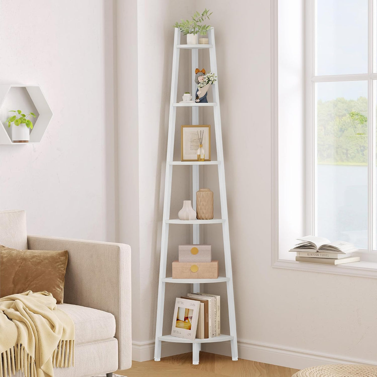 Same ladder corner shelf shown in a white finish, styled with books and neutral decorative pieces.