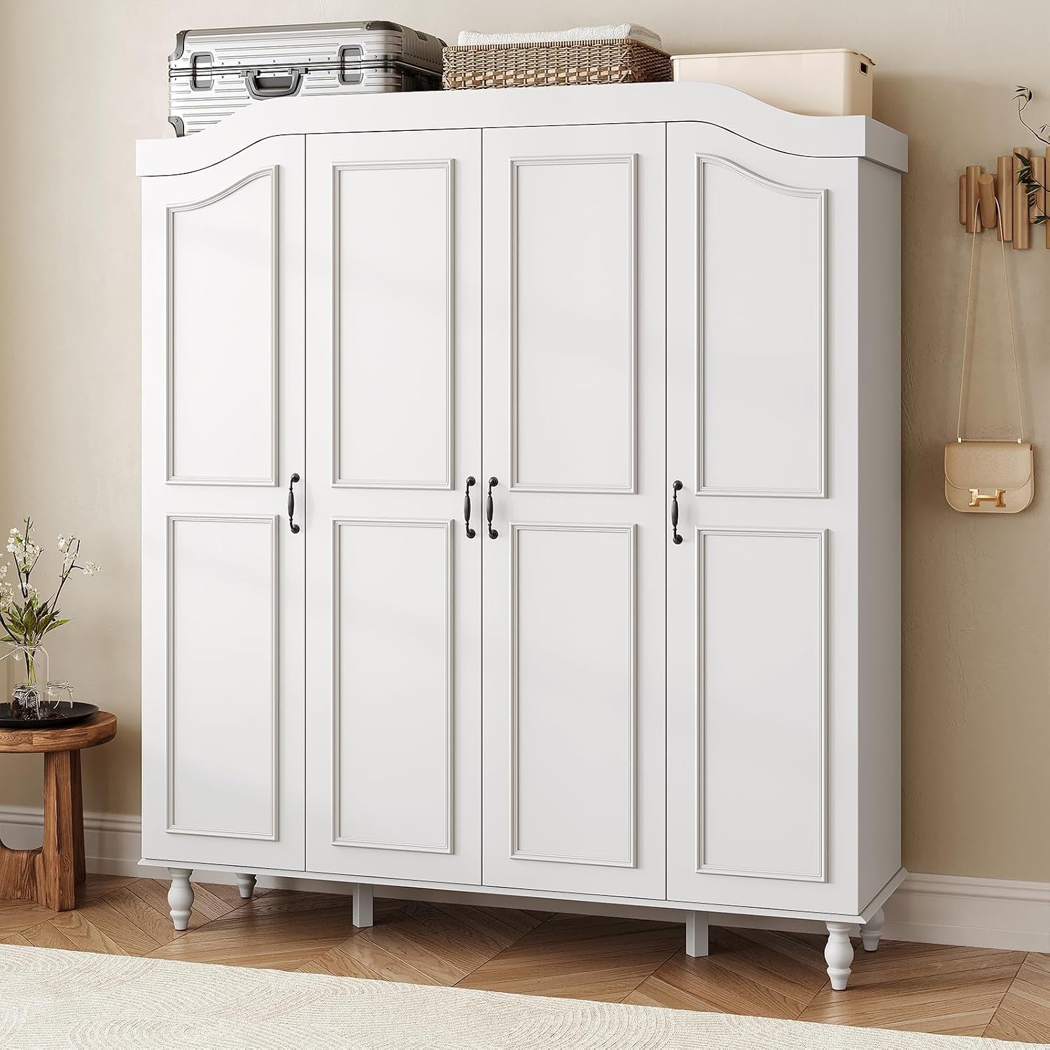 White arched 4-door wardrobe with carved rectangular panels and black handles, front view