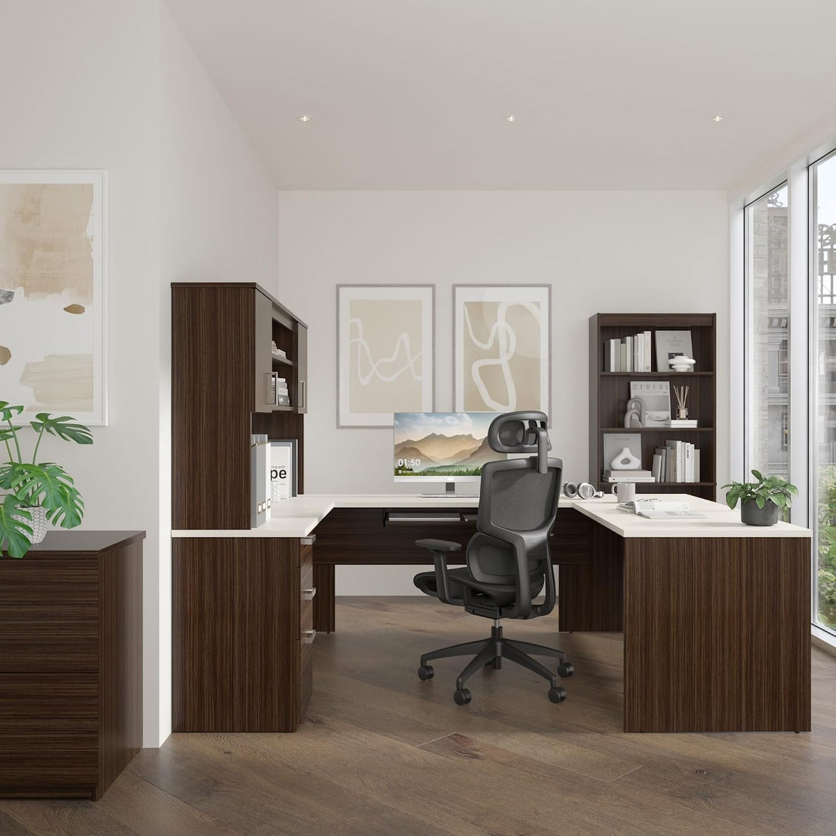 Front view of U-shaped desk and hutch with ergonomic office chair in a bright room